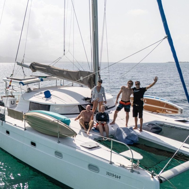 Venezia 42 catamaran with guests sunbathing and preparing for sailing in San Blas, Panama
